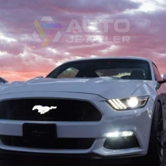 White Ford Mustang with 'Auto Jeweller' logo in the background