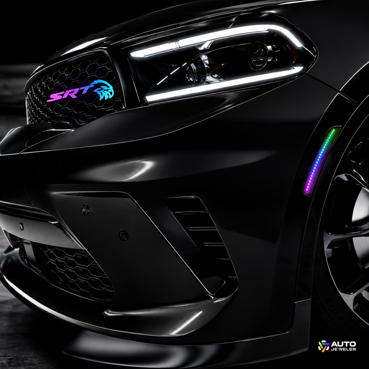 AutoJeweler SRT Trackhawk Hellhawk RGB Flow Series LED grille emblem installed on black Dodge performance vehicle with illuminated RGB side marker lights