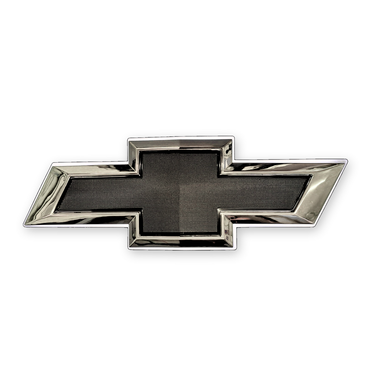 Chrome and black Chevrolet bowtie grille emblem with textured black center and chrome trim, front view on white background