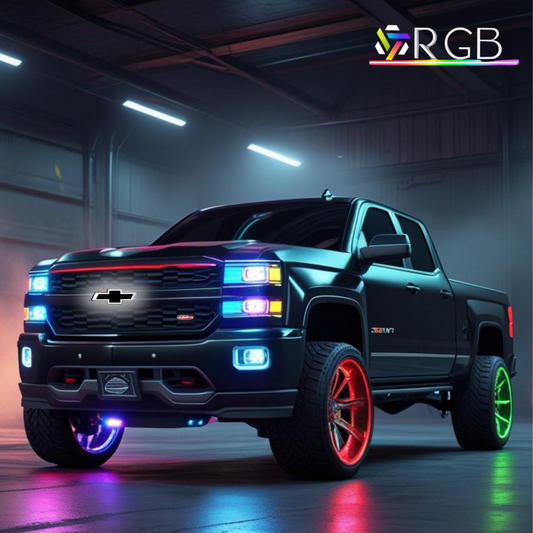 2014–2015 Chevy Silverado 1500 with black chrome RGB LED bowtie grille emblem glowing, RGB branding in garage setting