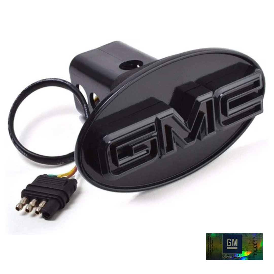 Gloss black GMC LED hitch cover with dual-intensity red brake and running lights, fits 1.25 and 2 inch trailer receivers, plug and play 4-way connector AutoJeweler