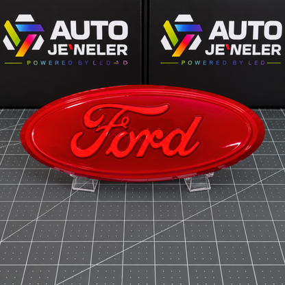 AutoJeweler Custom painted red Ford 9-inch dynamic LED grille and tailgate badge illuminated with red LED Ford script.