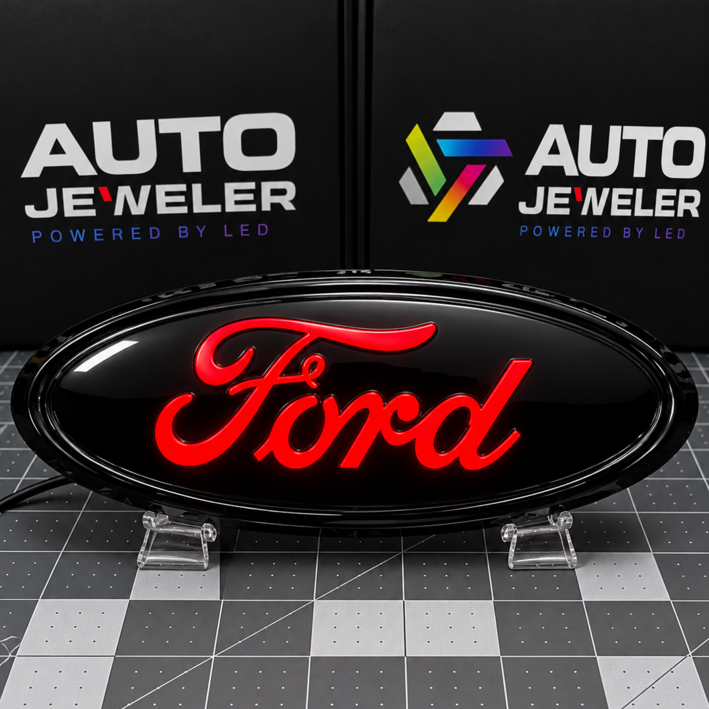 AutoJeweler Gloss black Ford 9-inch dynamic LED grille and tailgate badge illuminated with bright red LED Ford script.