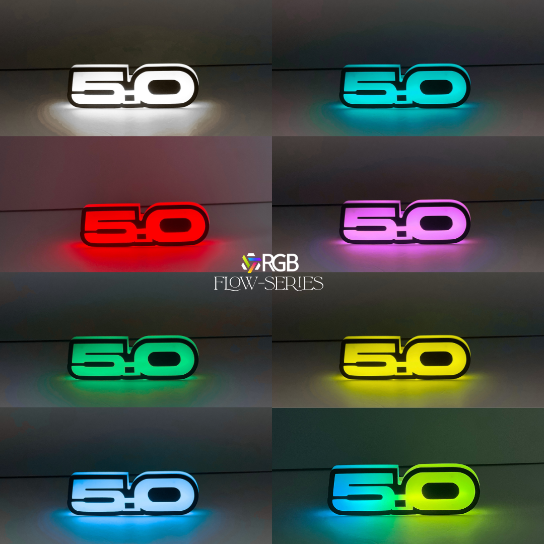 Ford Mustang 5.0 RGB Flow Series LED grille emblem glowing in white , red, green, blue, purple, yellow, and blue yellow.