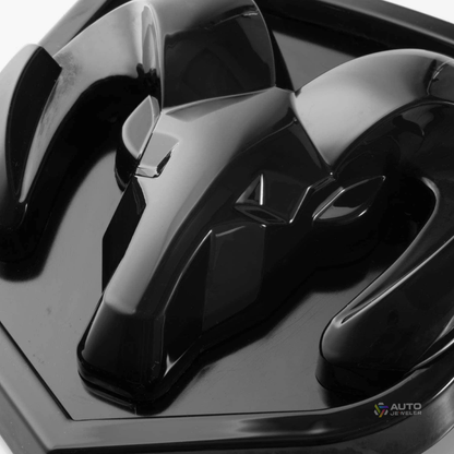 Close-up angled view of black LED RAM grille emblem
