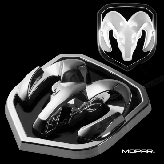 2009–2018 RAM LED grille emblem chrome black angled close-up showing OEM style finish