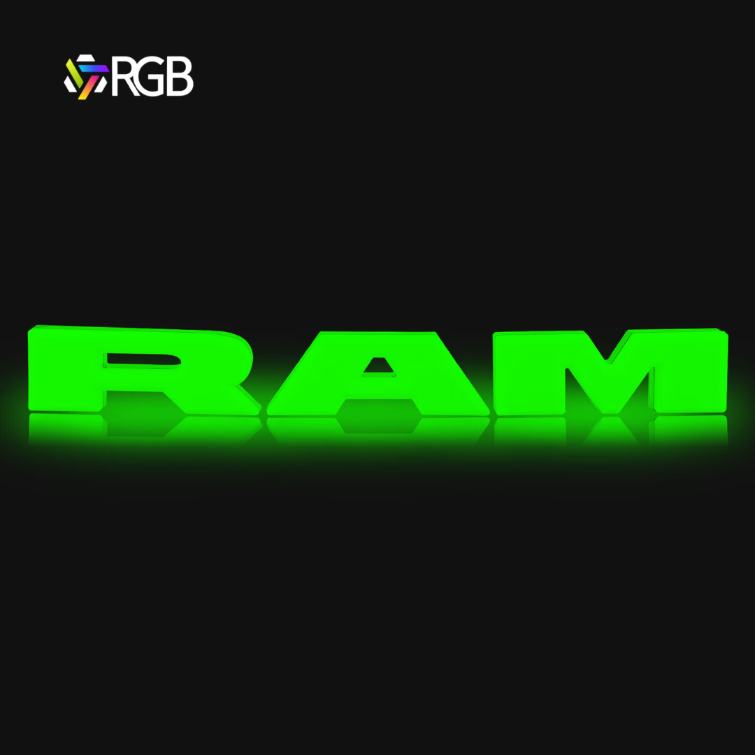 RAM 1500 black RGB LED grille emblem illuminated in green, glowing effect on black background, AutoJeweler RGB branding