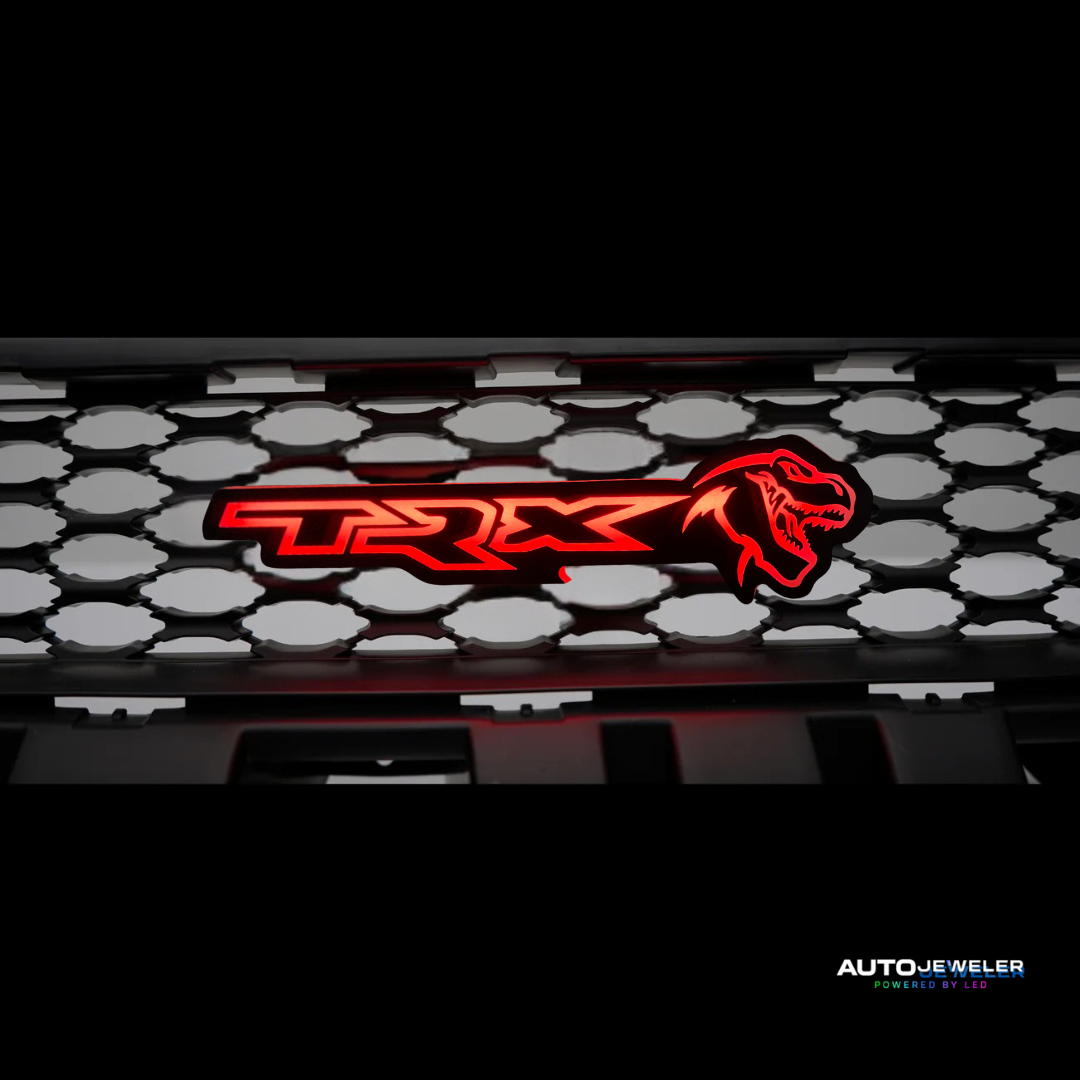 Red 'TRX' logo on a black and white checkered background