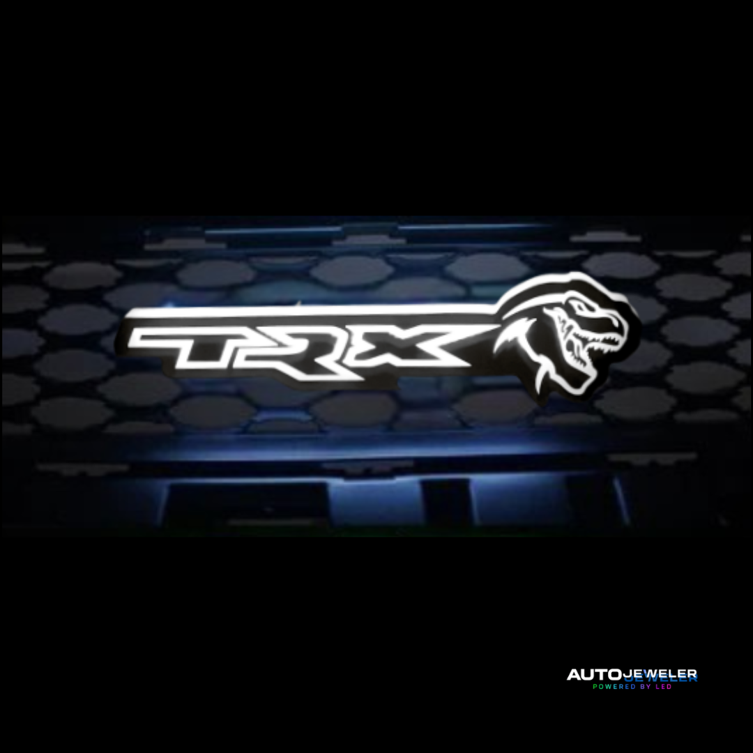 TRX logo on a car grille with a honeycomb pattern