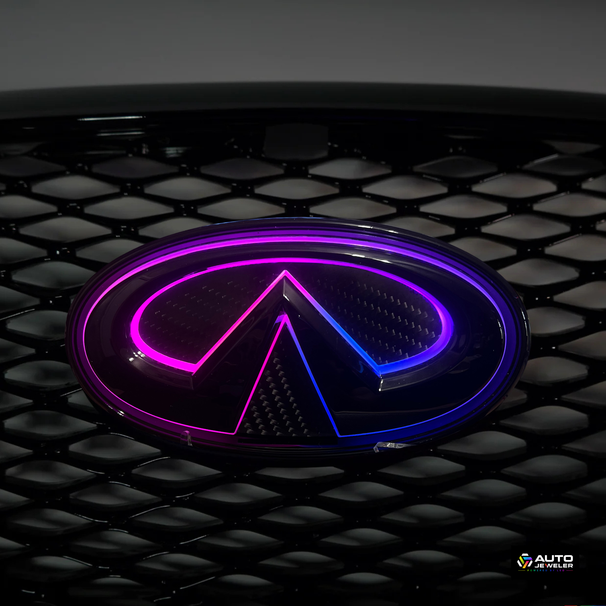 2018–2024 Infiniti Q50 Multicolor Flow Series LED Grille Emblem – Gloss Black/Carbon Fiber