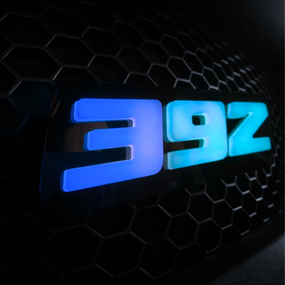 392 LED grille emblem blue illumination close-up AutoJeweler night lighting