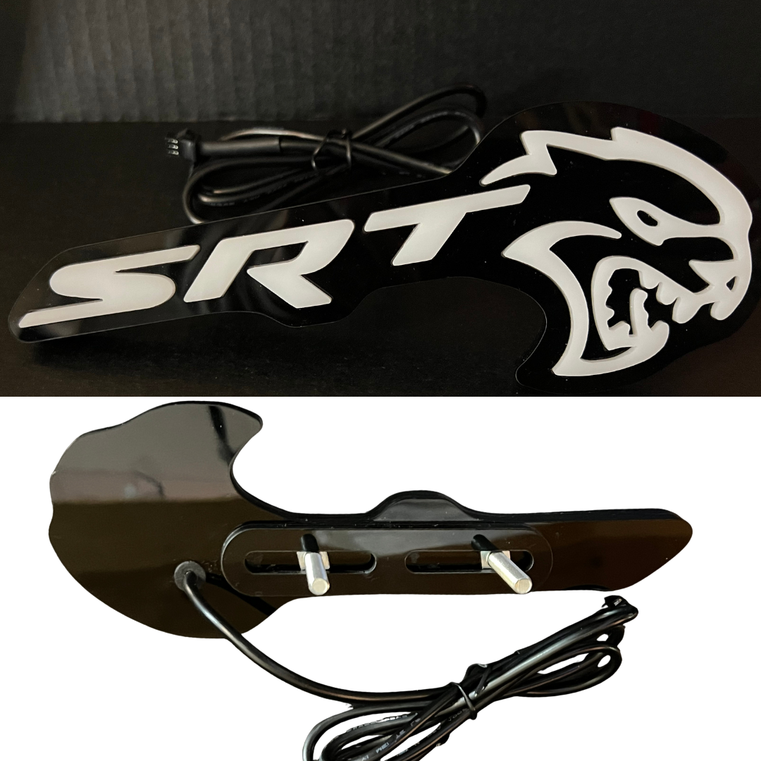 Front and rear views of Flow Series Hellcat Redeye-style LED grille emblem showing face design and rear mounting studs