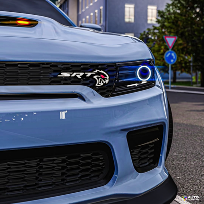 Flow Series Hellcat Redeye-style LED grille emblem installed on blue Dodge Charger front end view