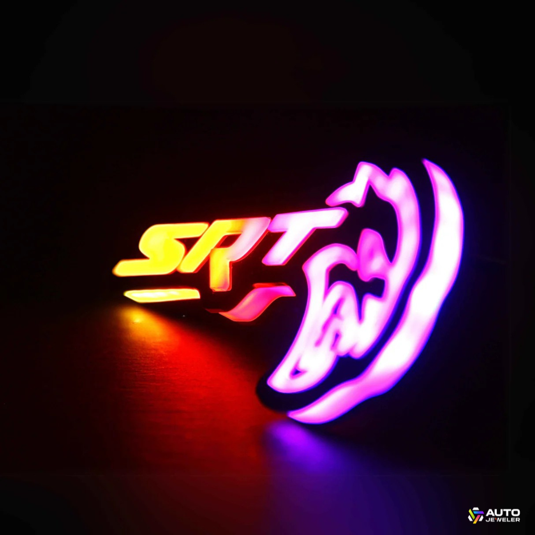 Flow Series RGB LED Hellcat Redeye-style grille emblem angled beauty photo showing multicolor glow