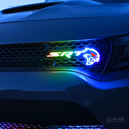 Flow Series RGB LED Hellcat Redeye-style grille emblem installed on Dodge Charger grille showing multicolor color-chasing effect