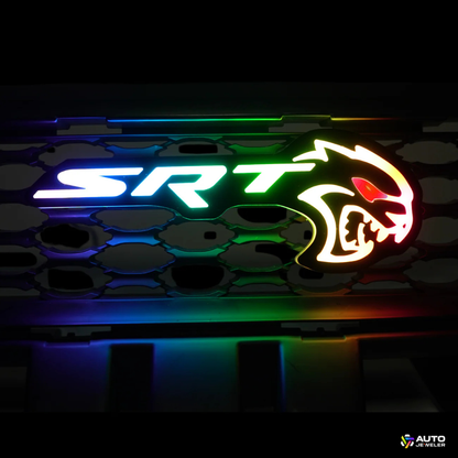 AutoJeweler Flow Series RGB LED Hellcat Redeye-style grille emblem showing rainbow color-chasing effect on mesh grille