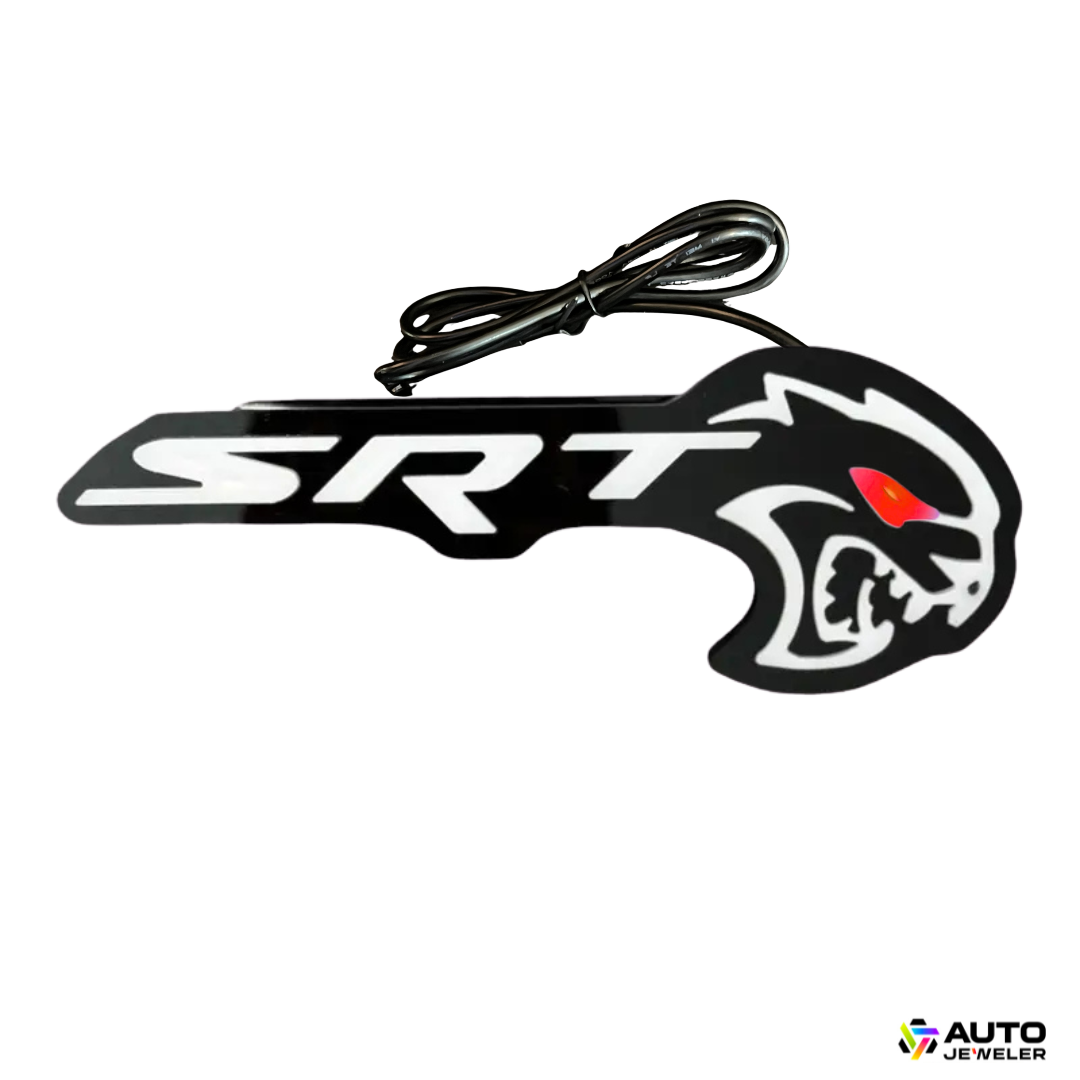 Flow Series Hellcat Redeye-style RGB LED grille emblem product photo on white background with wiring lead