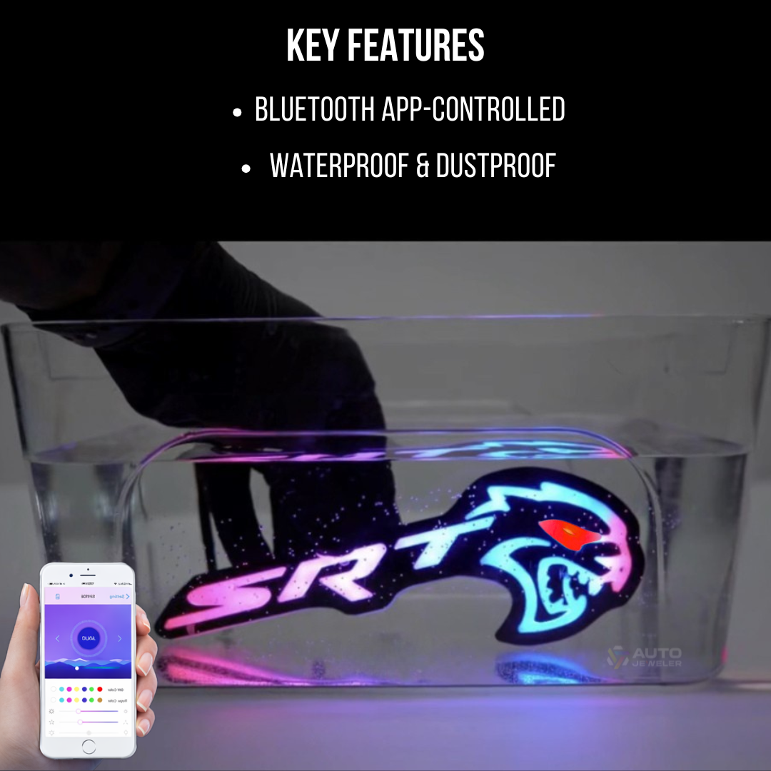 Flow Series Hellcat Redeye-style LED grille emblem waterproof test shown in water with Bluetooth app control