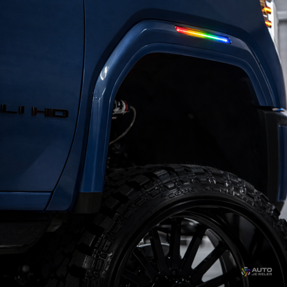 AutoJeweler RGB LED side marker lights installed on GMC Sierra 2500HD 3500HD truck showing multi-color illumination and smoked lens design