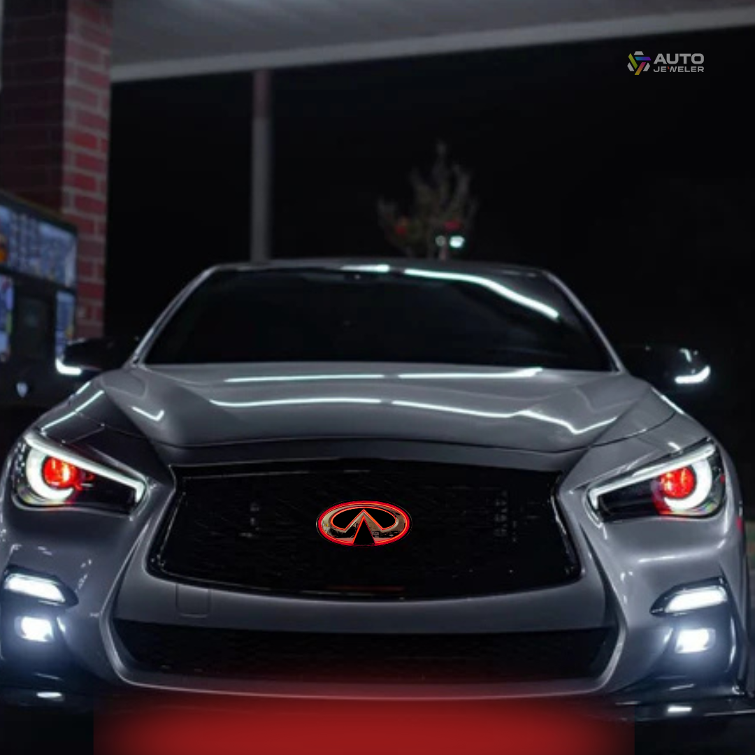 Infiniti Q50 with red glowing RGB front emblem installed at night