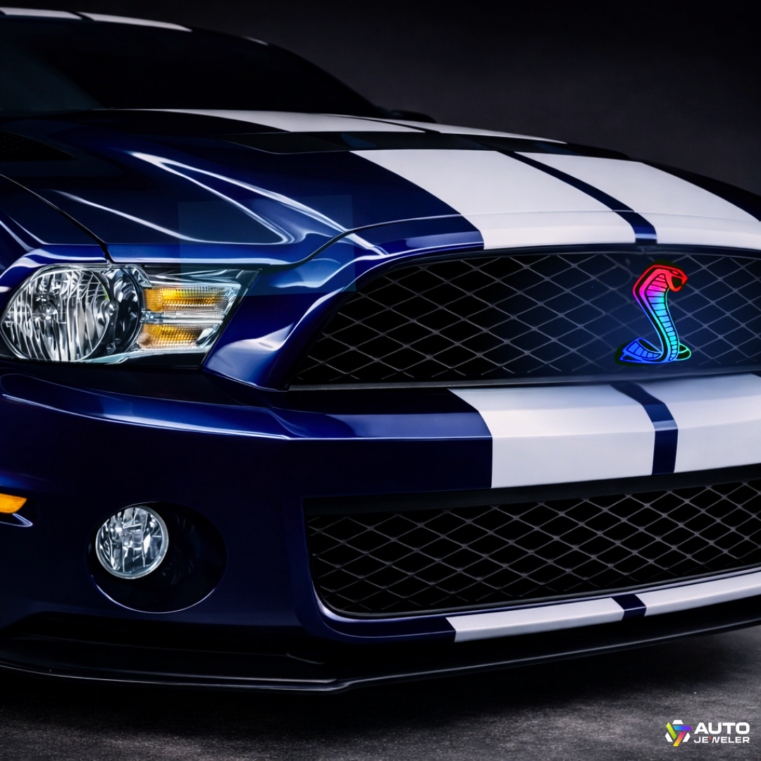 AutoJeweler Flow Series RGBW Cobra LED light-up grille emblem installed on Ford Mustang front grille