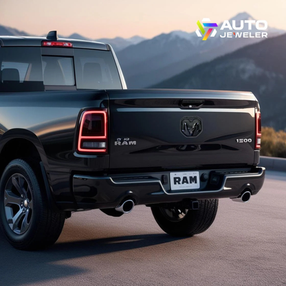 Black Edition RAM tailgate emblem installed on truck in daylight with mountain backdrop, emblem unlit