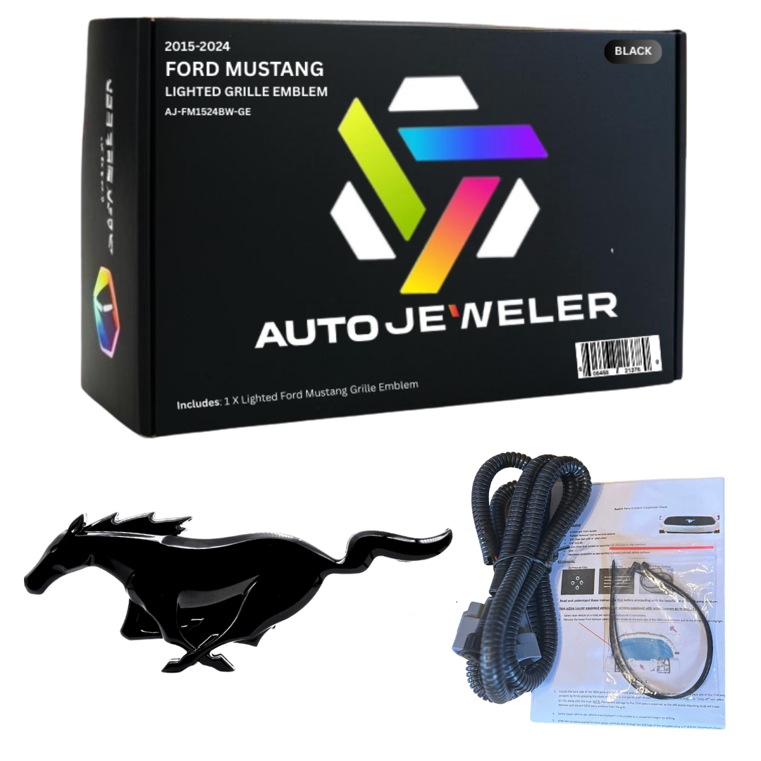 Auto emblem packaging with black emblem, cable, and instructions on a white background