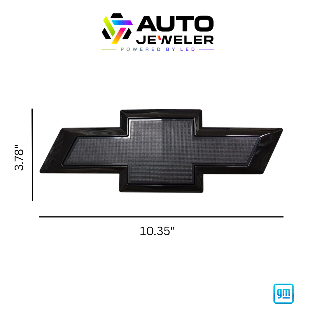 Black Chevy bowtie RGB grille emblem with dimensions labeled 10.35 inches wide by 3.78 inches tall, AutoJeweler branding above and GM mark below.