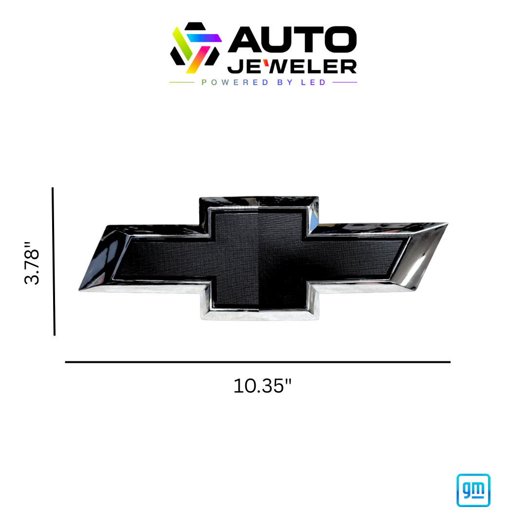Chrome and black Chevy bowtie RGB grille emblem with dimensions labeled 10.35 inches wide by 3.78 inches tall, AutoJeweler branding above and GM mark below.