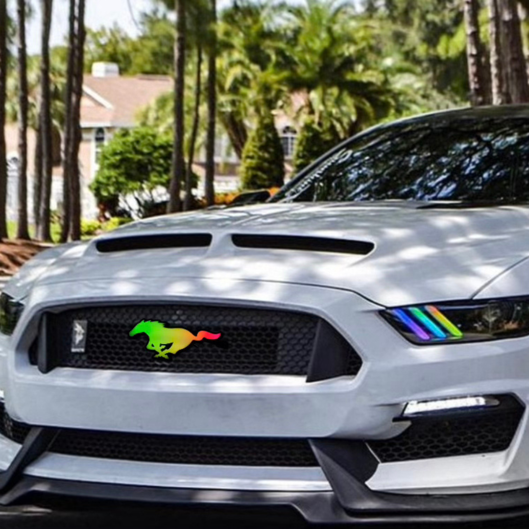 Multicolor Mustang Pony RGBW Flow-Series grille emblem glowing on Mustang front grille