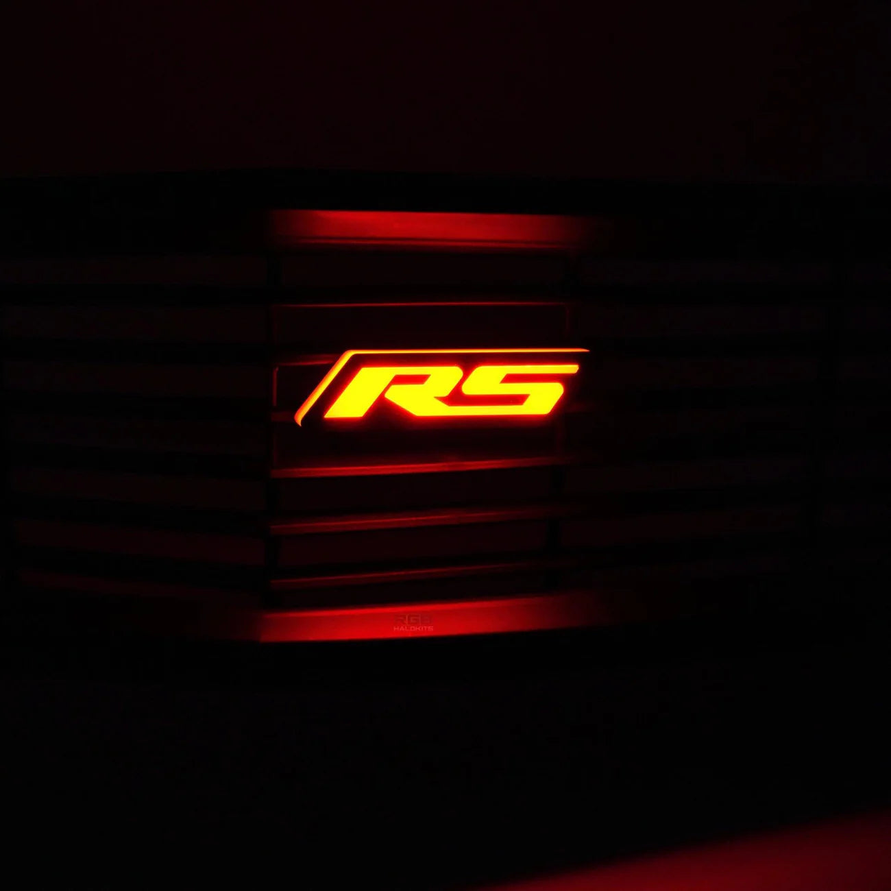 RS Flow Series LED emblem illuminated red on vehicle grille