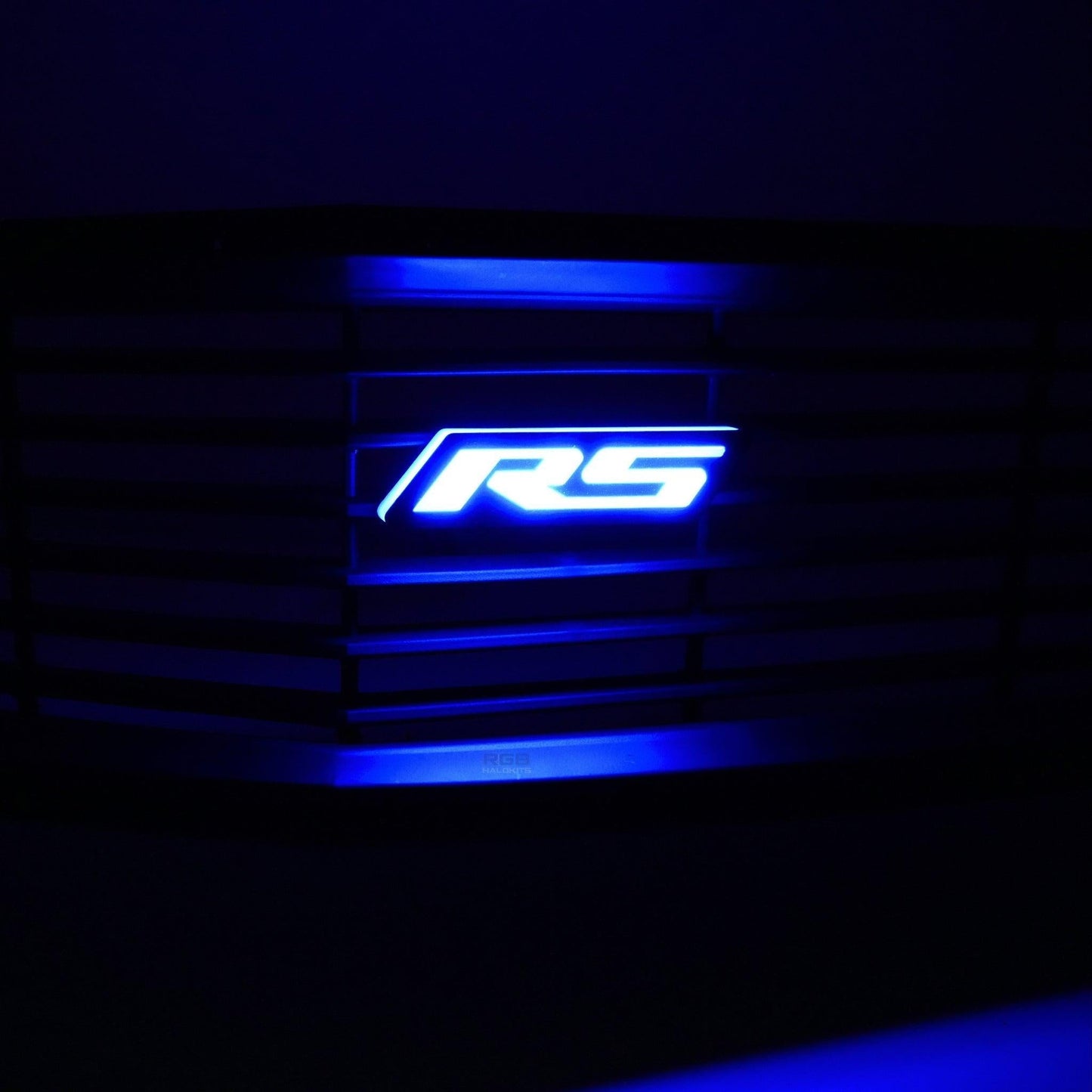 RS Flow Series LED emblem glowing blue mounted in vehicle grille