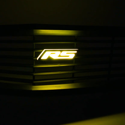 AutoJeweler RS Flow Series LED emblem illuminated yellow on vehicle grille