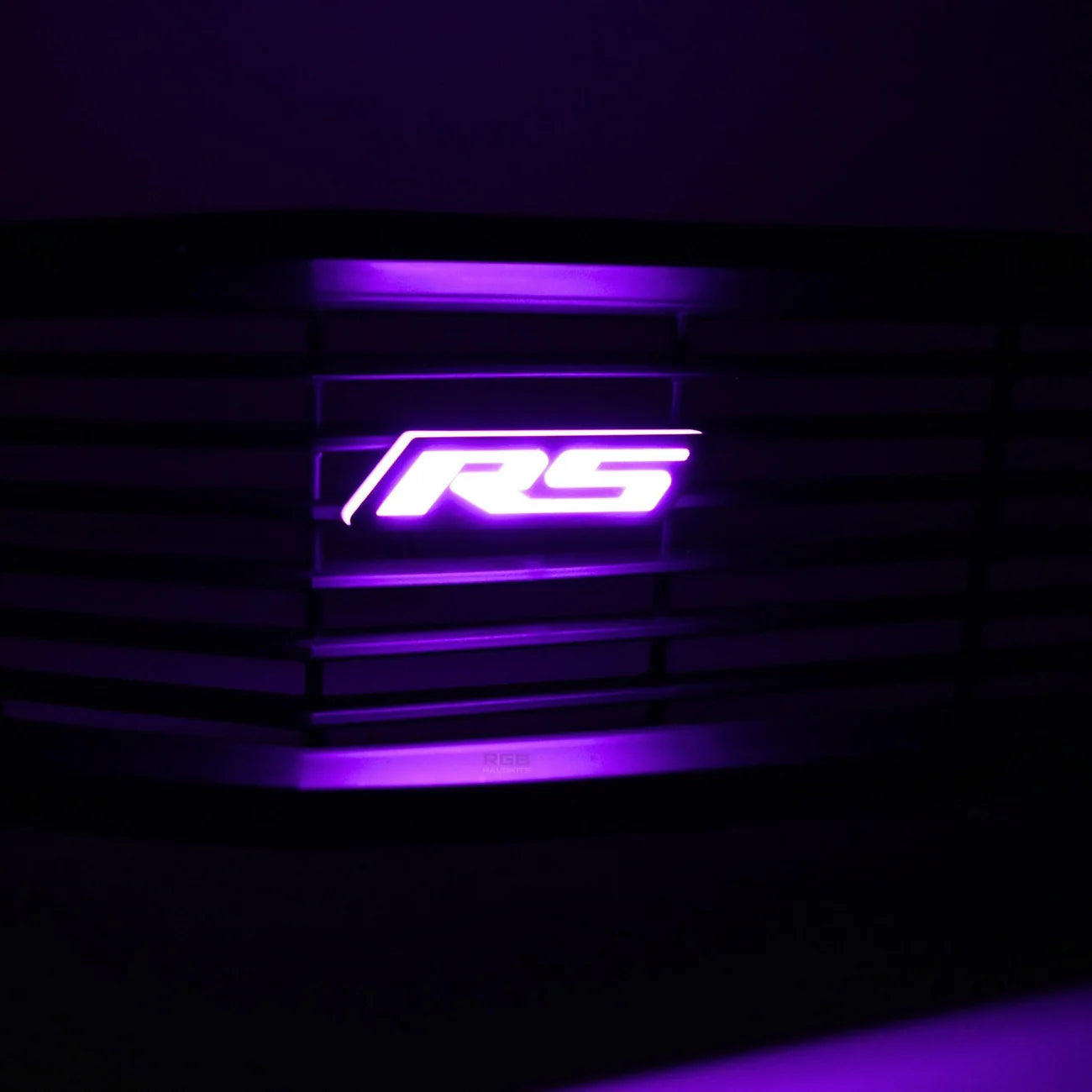 RS Flow Series LED emblem in purple lighting installed on front grille