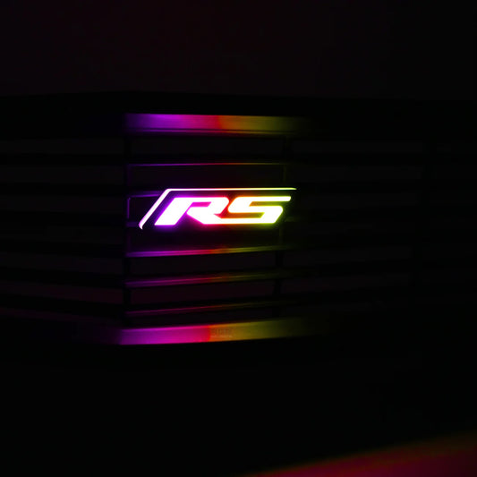RS logo with rainbow lighting effect on a dark background