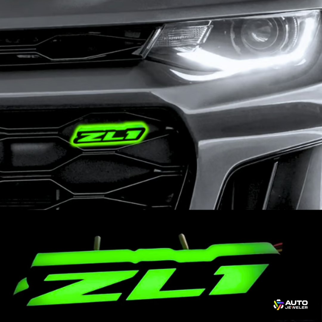 ZL1 LED emblem glowing bright green on Camaro grille at night – aftermarket lighting upgrade by AutoJeweler
