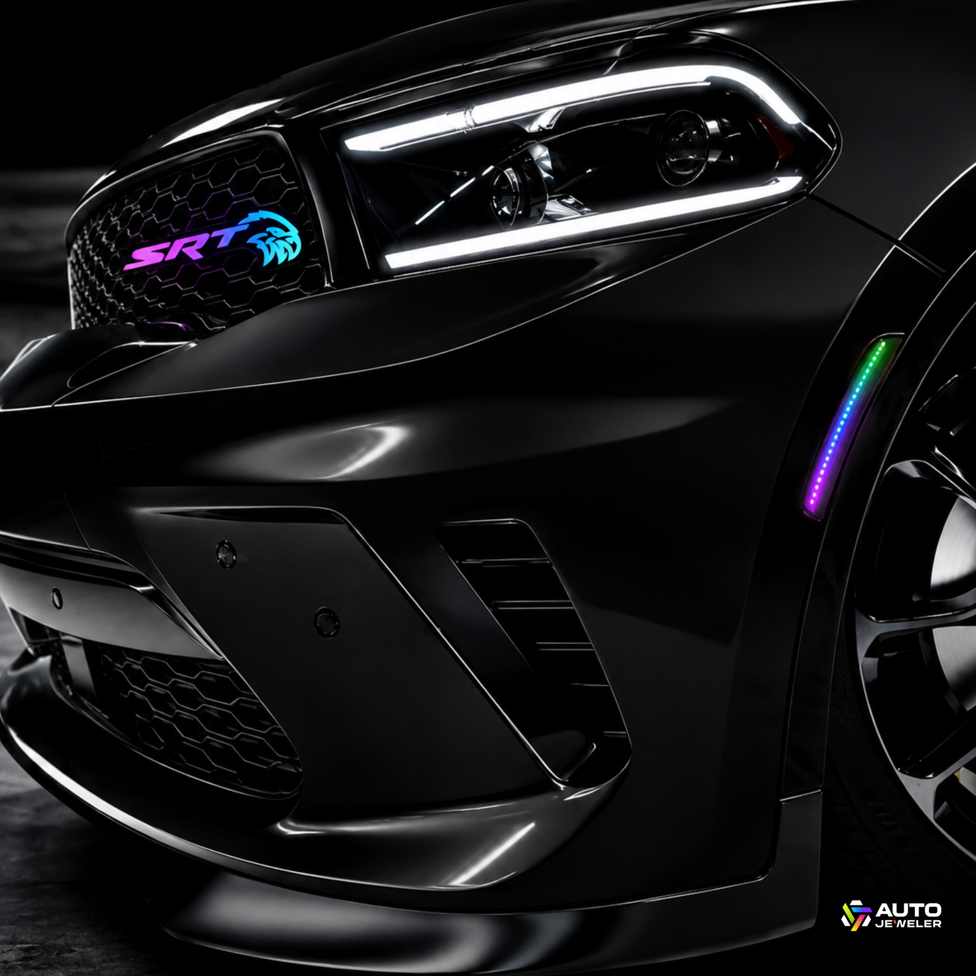 AutoJeweler SRT Trackhawk Hellhawk RGB Flow Series LED grille emblem installed on black Dodge performance vehicle with illuminated RGB side marker lights