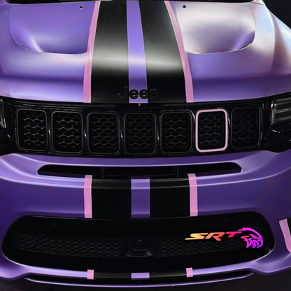 AutoJeweler SRT Trackhawk Hellhawk RGB Flow Series LED emblem mockup installed on purple Jeep Trackhawk grille with custom Mopar styling
