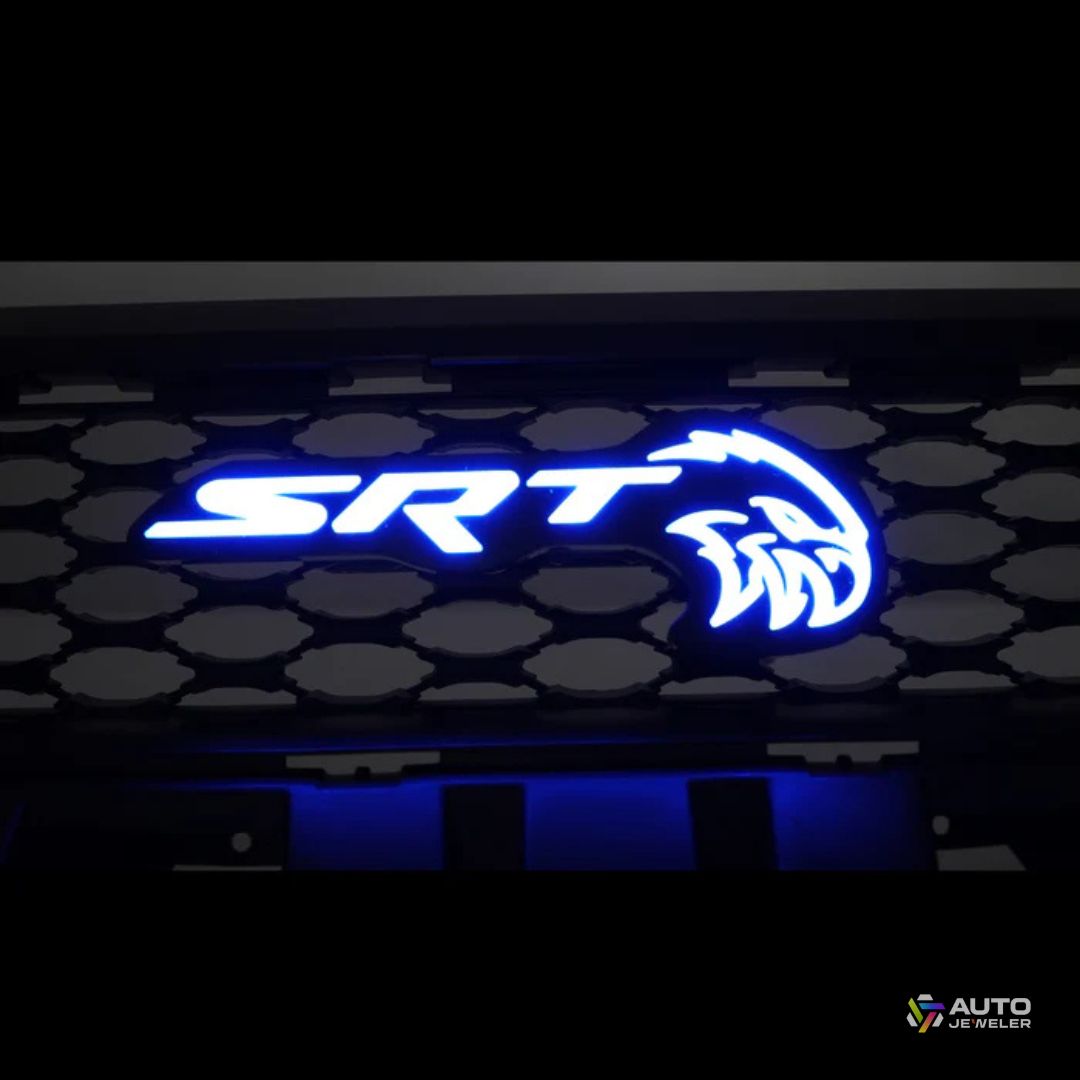 AutoJeweler SRT Trackhawk Hellhawk RGB Flow Series LED grille emblem illuminated in solid blue on honeycomb grille