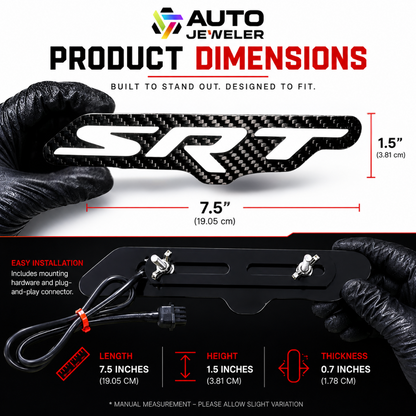 Product dimensions graphic for an Auto Jeweler SRT car emblem badge, showing a black carbon-fiber-textured badge with white SRT lettering, held by gloved hands with measurements of 7.5 inches by 1.