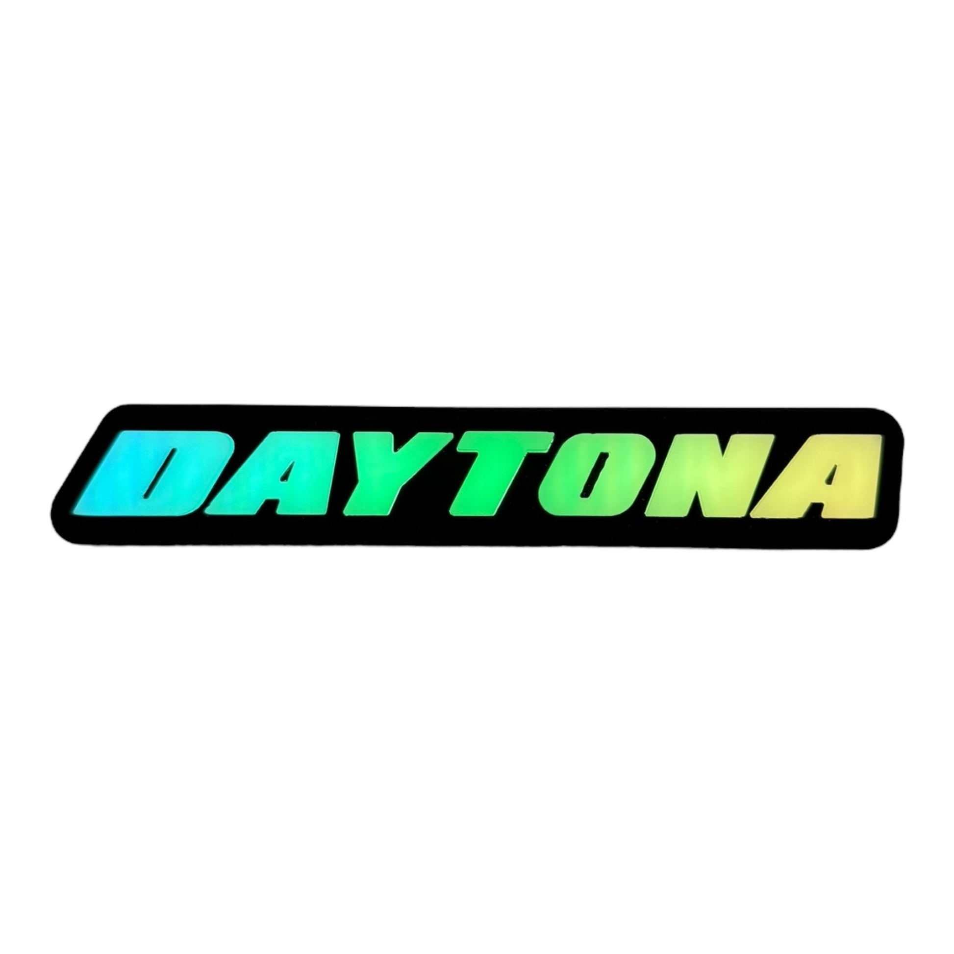 Daytona RGB LED grille emblem with teal green and yellow gradient lighting effects on white background