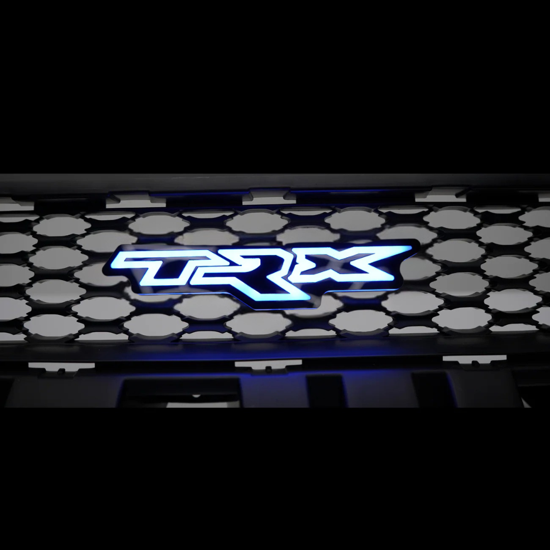 TRX LED grille badge illuminated in blue mounted in the front grille