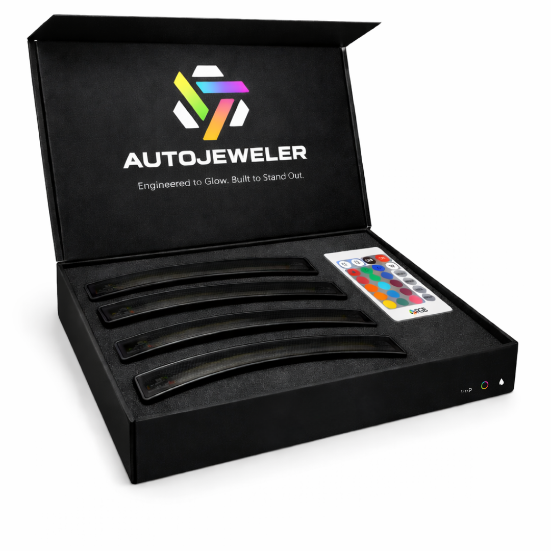 AutoJeweler RGB LED side marker light kit showing four smoked lens markers with foam insert packaging and handheld remote control