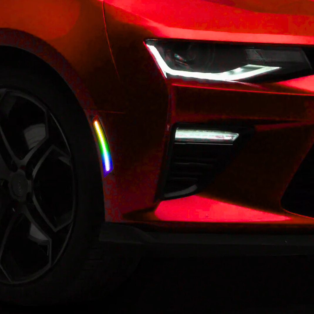 AutoJeweler RGB LED side marker lights installed on Chevy Camaro showing smoked lens multicolor illumination on front fender