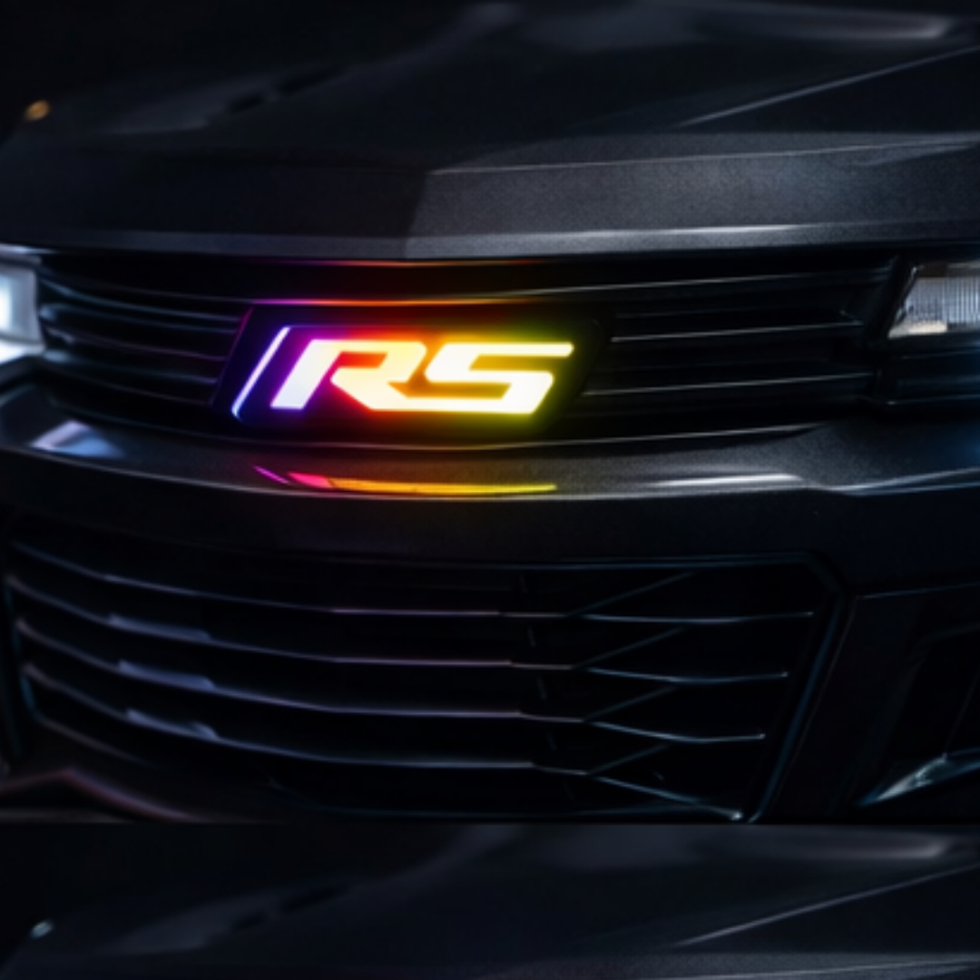 AutoJeweler RS Flow Series RGB LED emblem installed in vehicle grille with multicolor lighting