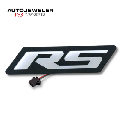 AutoJeweler RS Flow Series LED grille emblem on white background with wiring connector