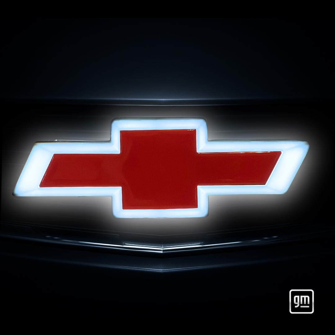 Close-up of red Chevy Bowtie with white LED perimeter accent, installed on grille