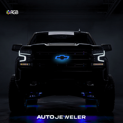RGB LED grille bowtie glowing blue on Chevy Silverado front; black emblem