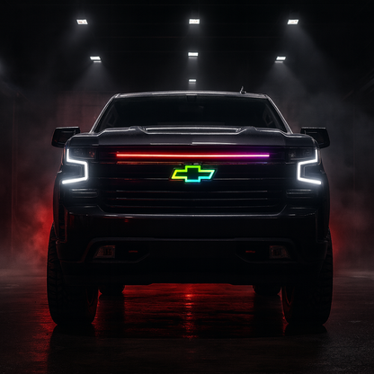 Chevrolet truck front view with illuminated logo in a dark setting