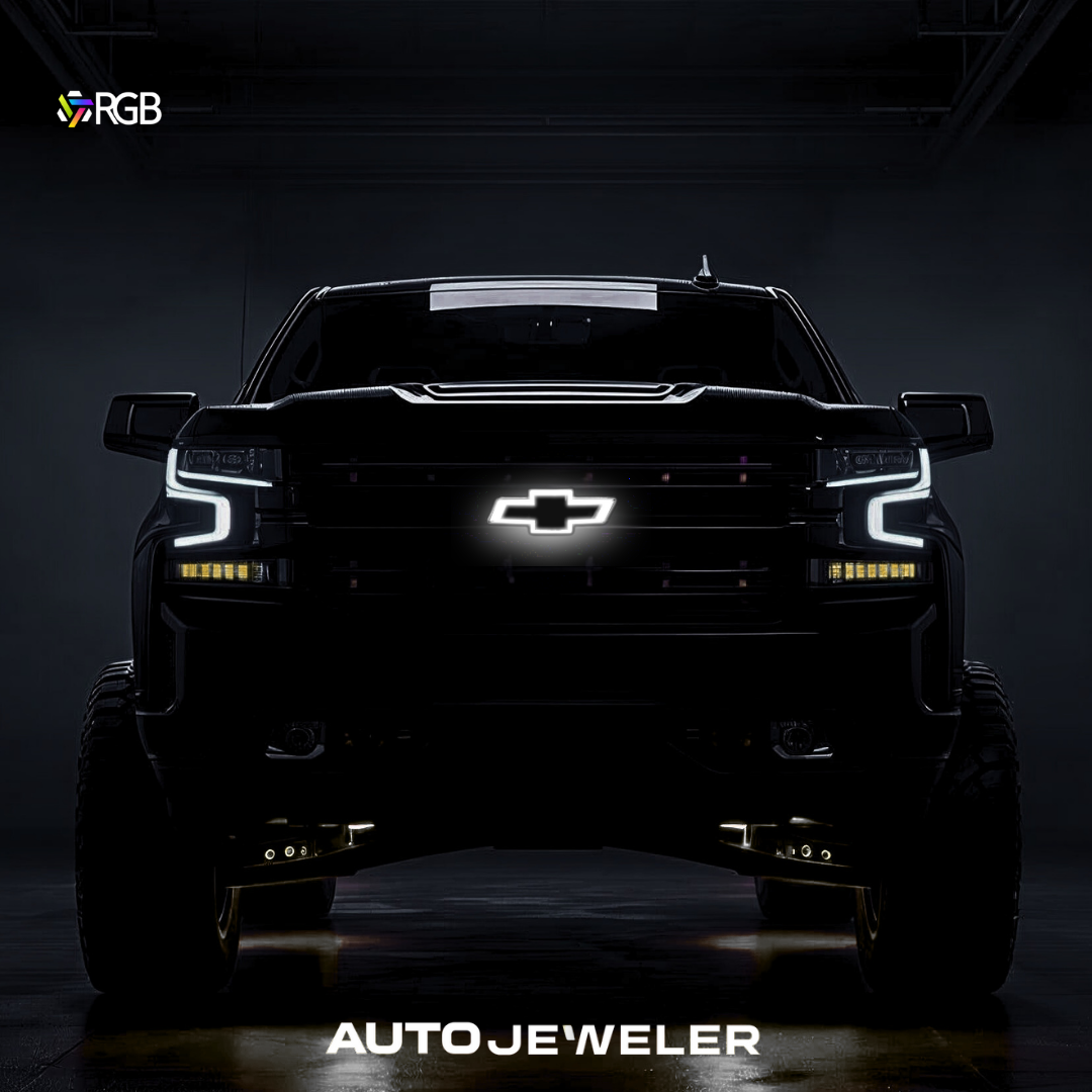 RGB LED grille bowtie glowing white on Chevy Silverado; chrome/black finish, front hero shot